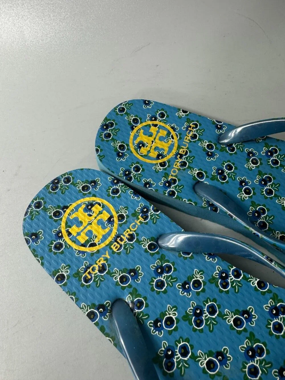 Tory Burch All Over Print Flip Flops in Blue